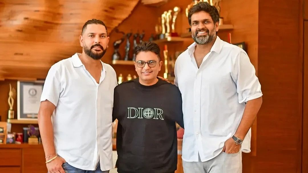 <div class="paragraphs"><p>Producer Bhushan Kumar flanked by Yuvraj Singh and Ravi Bhagchandka.</p></div>